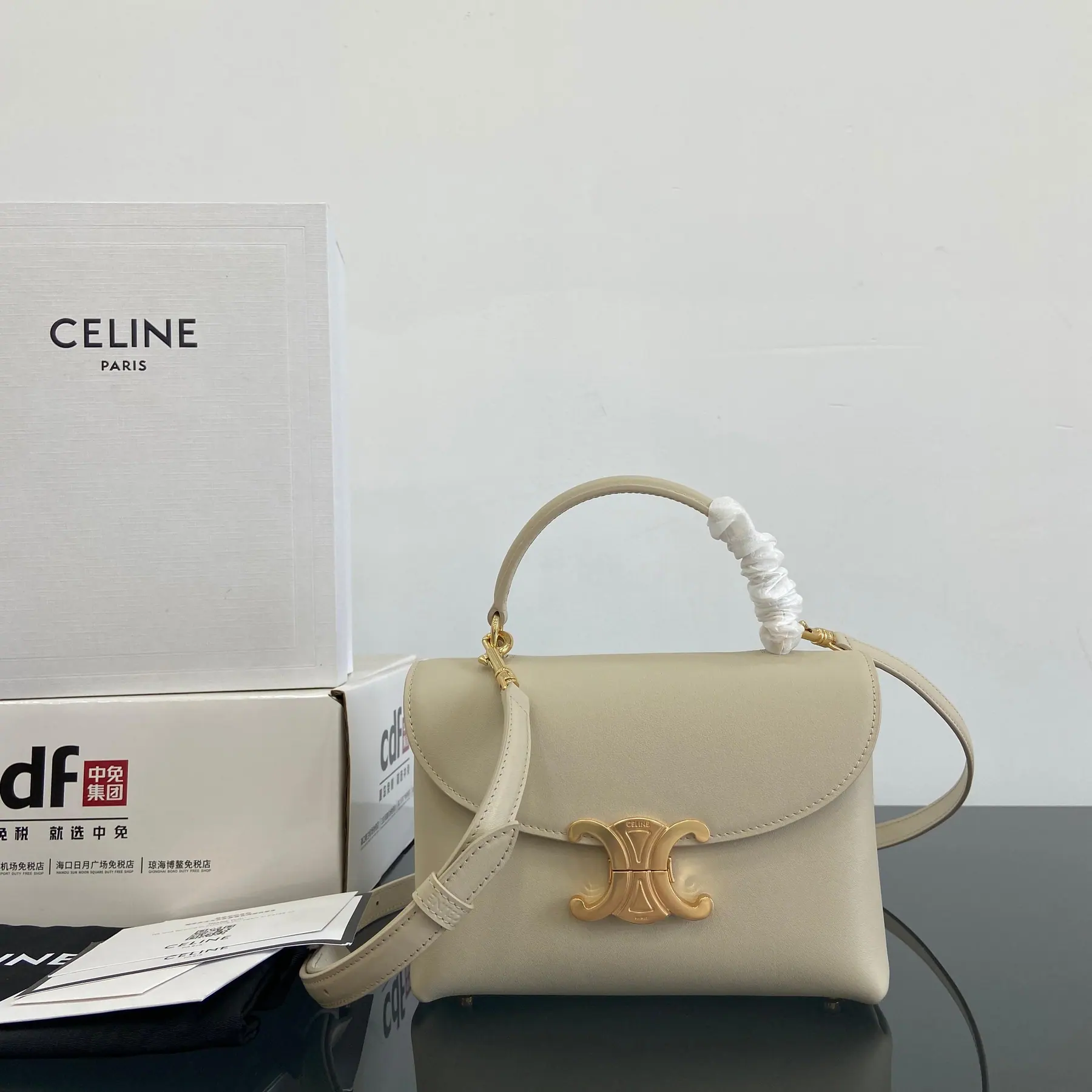 Celine 奶油色细罐柔软缎面 Nino 包 118113 20.5x13x8cm